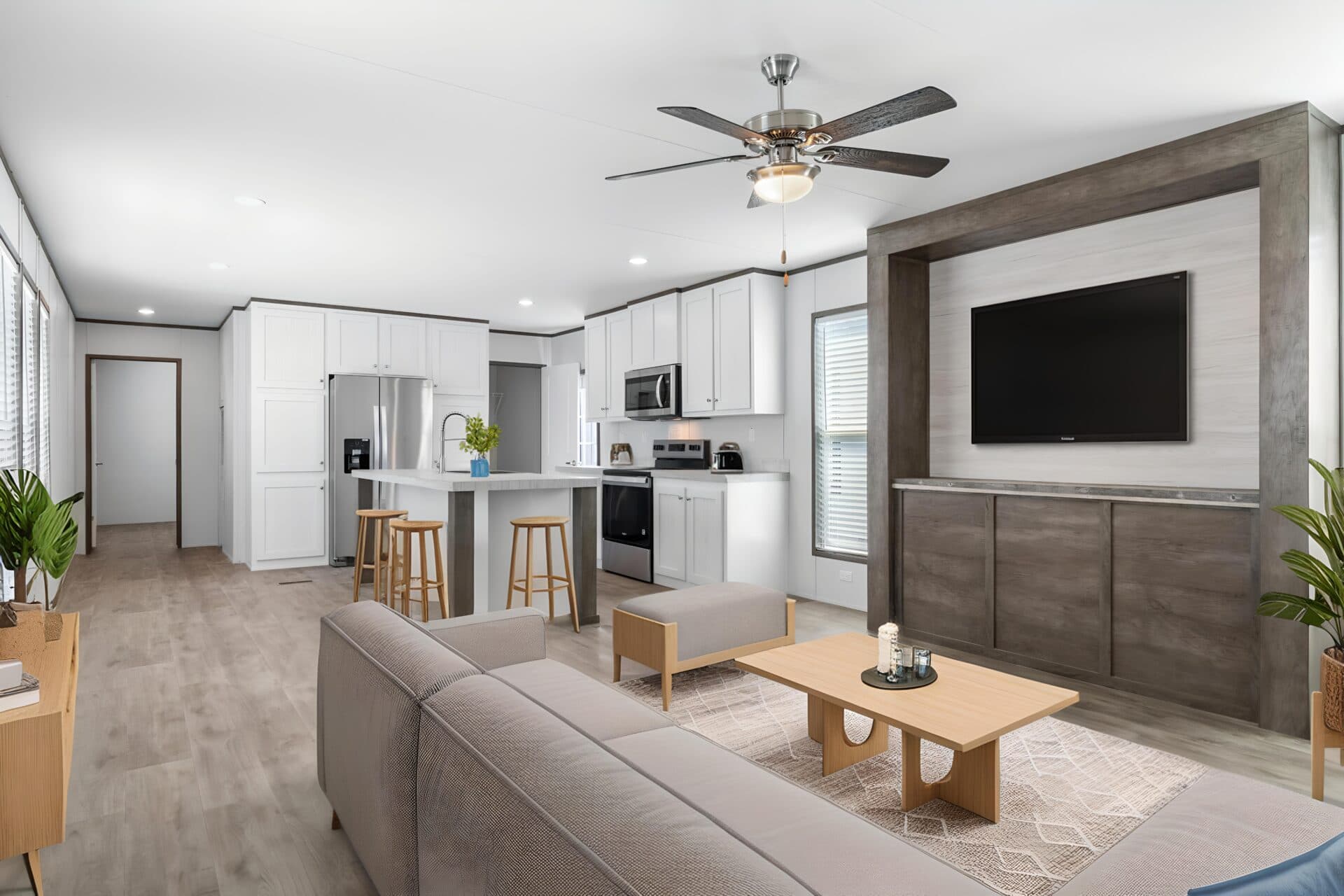 Open living area looking through to the kitchen island and range